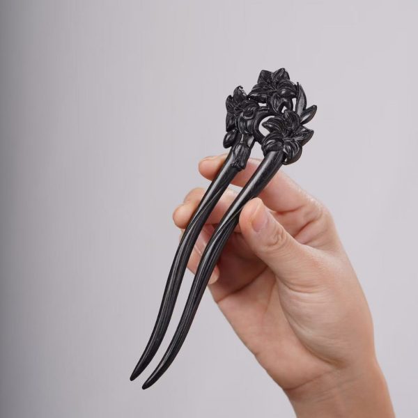 16. Three blossom black