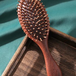 Golden sandalwood hair brush.