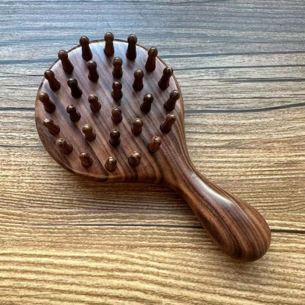 Rosewood tooth shaping massage comb.